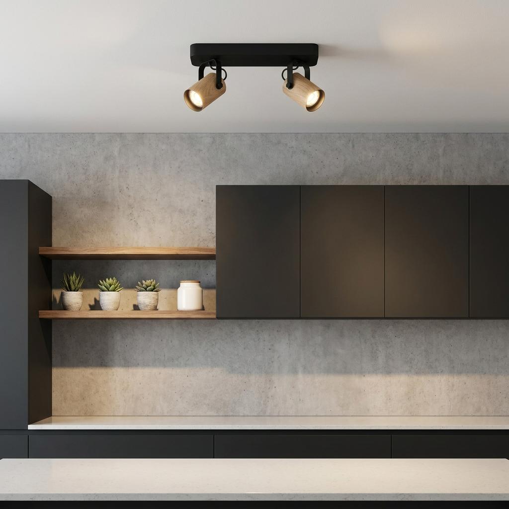 Eglo Cayuca 2-light bar spotlight with wooden shades mounted on a kitchen ceiling above black cabinets.