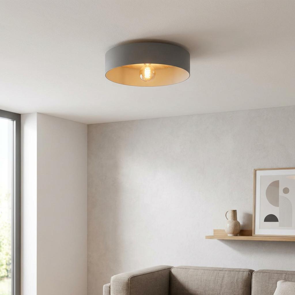 Grey and wood-effect round flush ceiling light illuminating a modern neutral-toned living room.