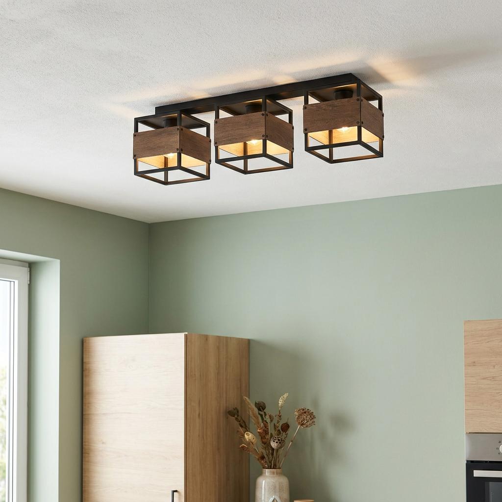 Three-light industrial flush ceiling fixture with black metal frames and wood accents in a modern room.