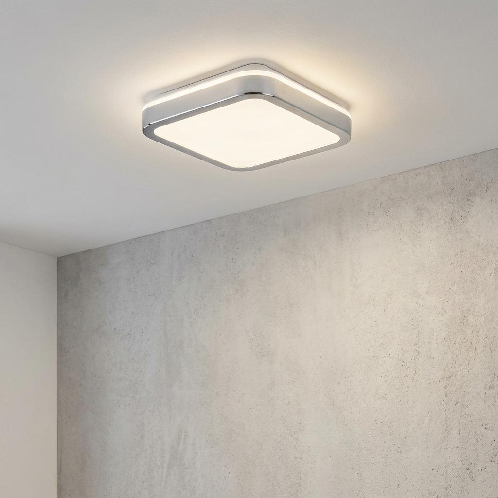 Square Eglo Manilva 1 chrome LED flush bathroom light mounted on a white ceiling against a textured grey wall.