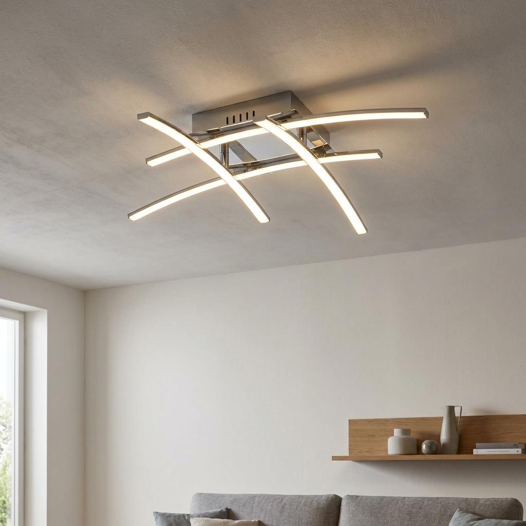 Modern Eglo Nevado LED chrome flush ceiling light with four curved, intersecting illuminated bars in a living room.
