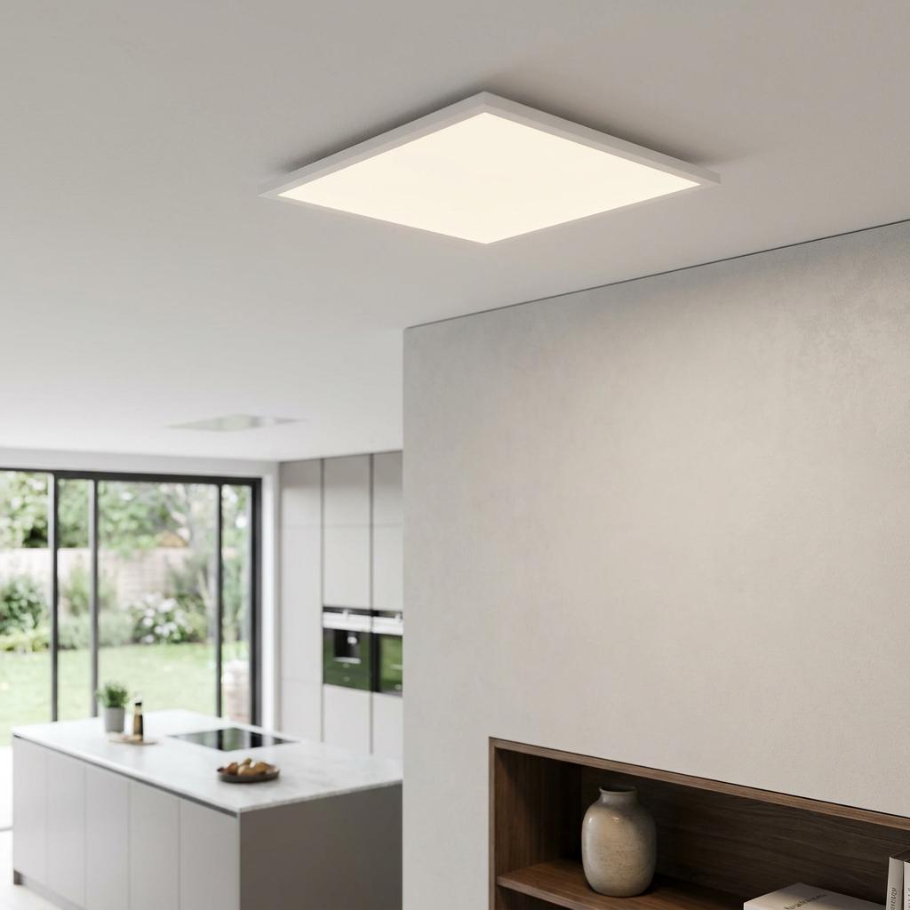 Square white LED flush panel light mounted on a modern kitchen ceiling.
