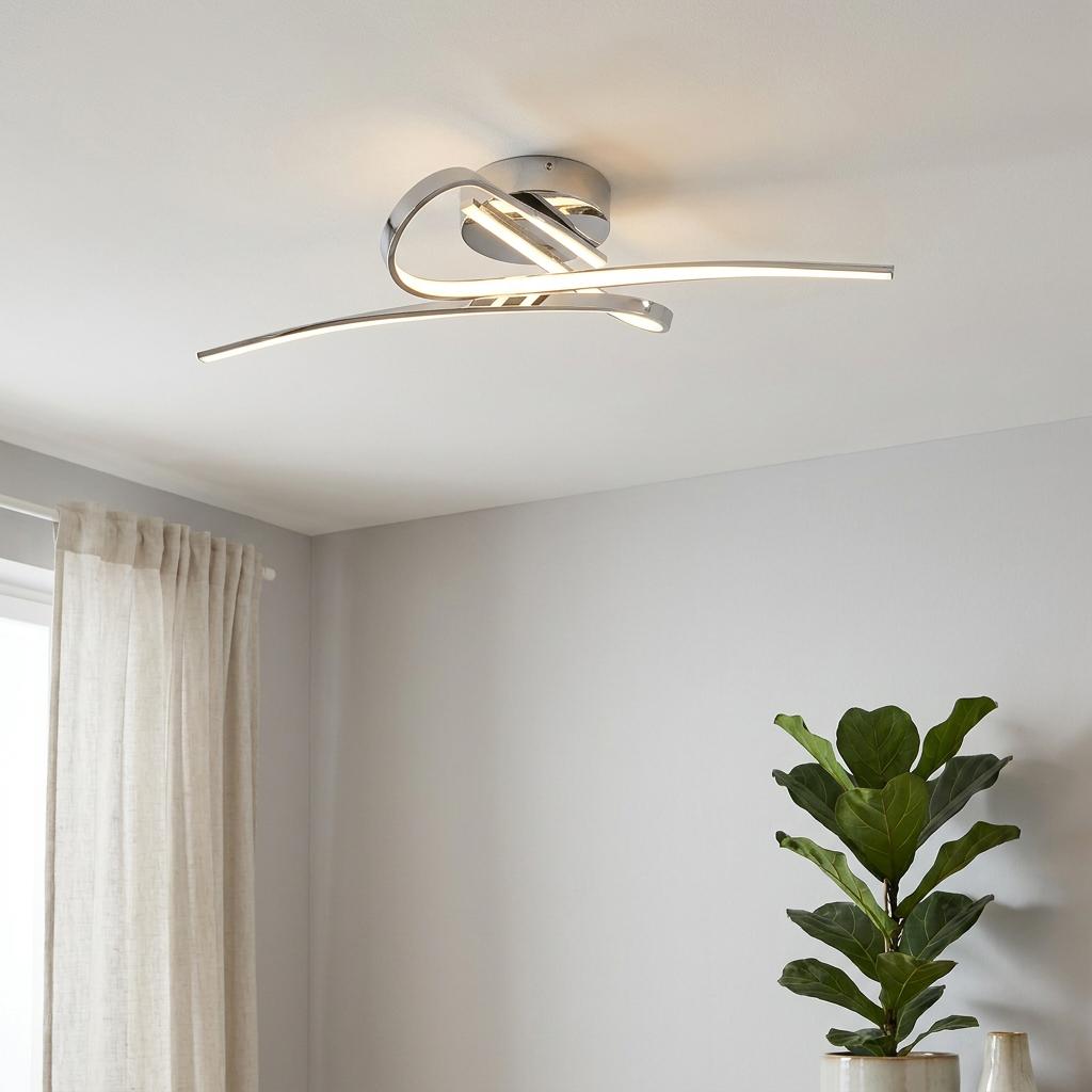 Contemporary chrome LED ceiling flush with curved light bars in a bright room with a potted plant and neutral curtains.