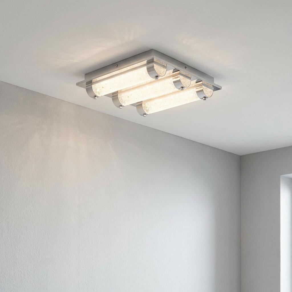 Modern three-light crystal flush bathroom ceiling fixture with a polished chrome base.