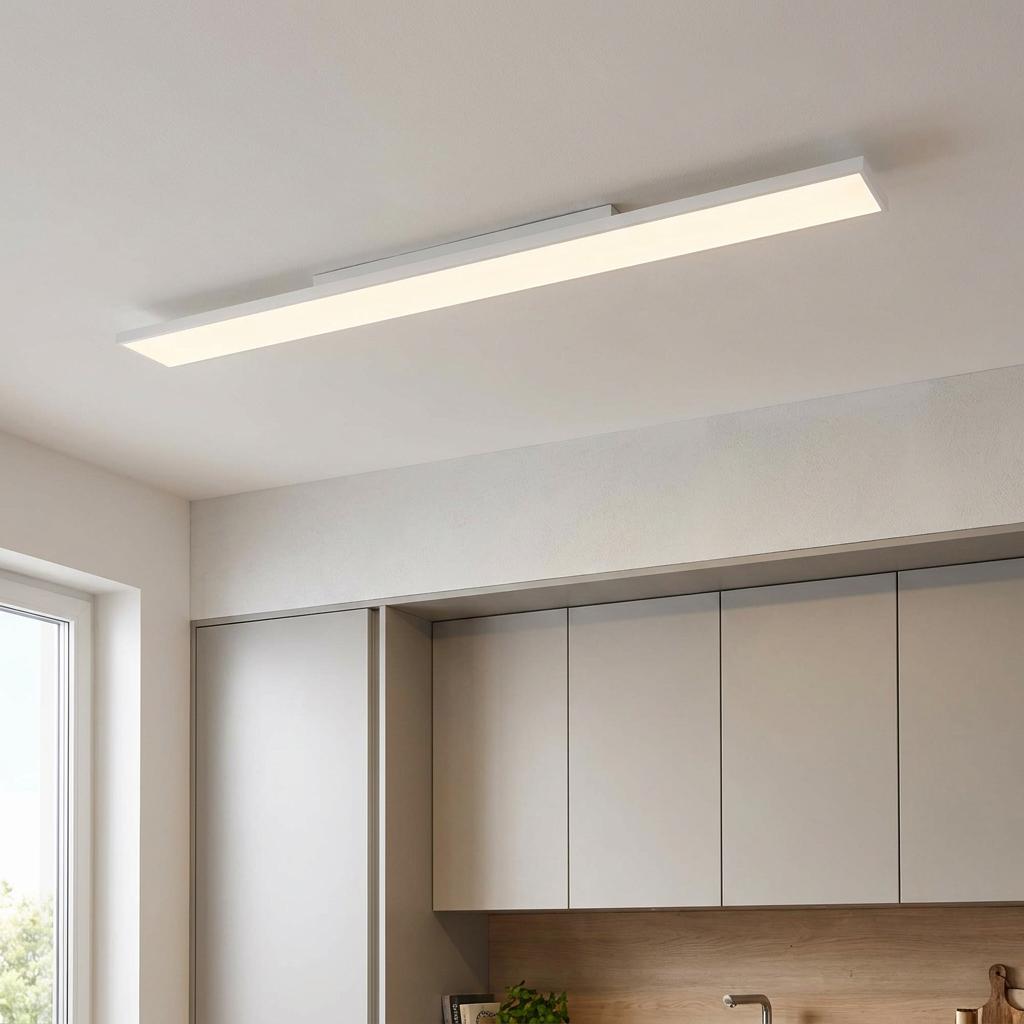 Eglo Turcona long rectangular LED flush ceiling light illuminating a modern kitchen with grey cabinets.