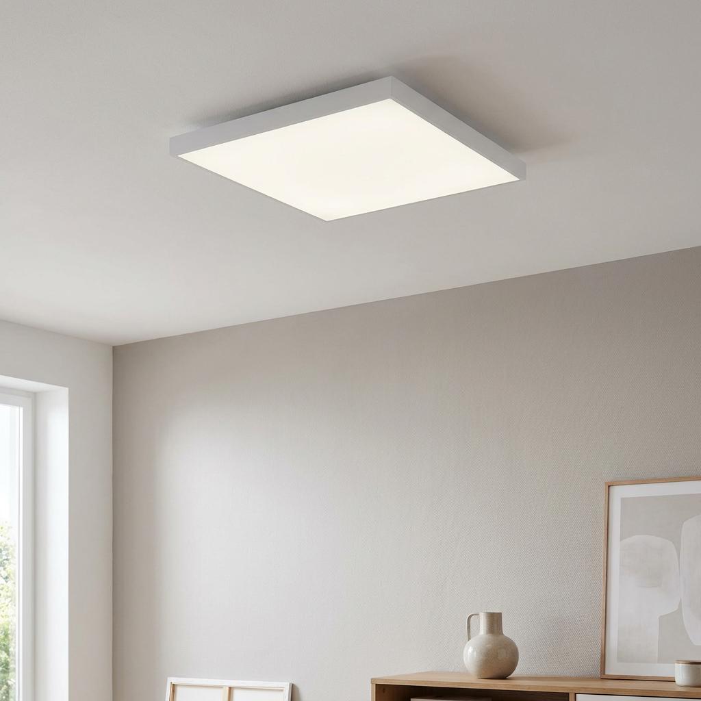 Eglo Turcona square white LED flush ceiling light illuminating a minimalist room with neutral walls.