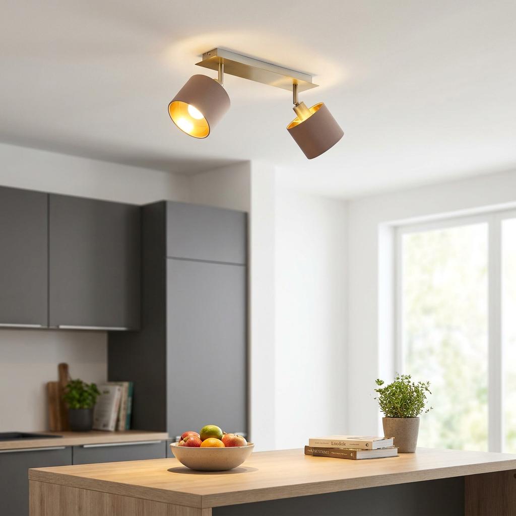Eglo Valbiano 2-light bar spotlight with taupe fabric shades and gold lining mounted on a modern kitchen ceiling.