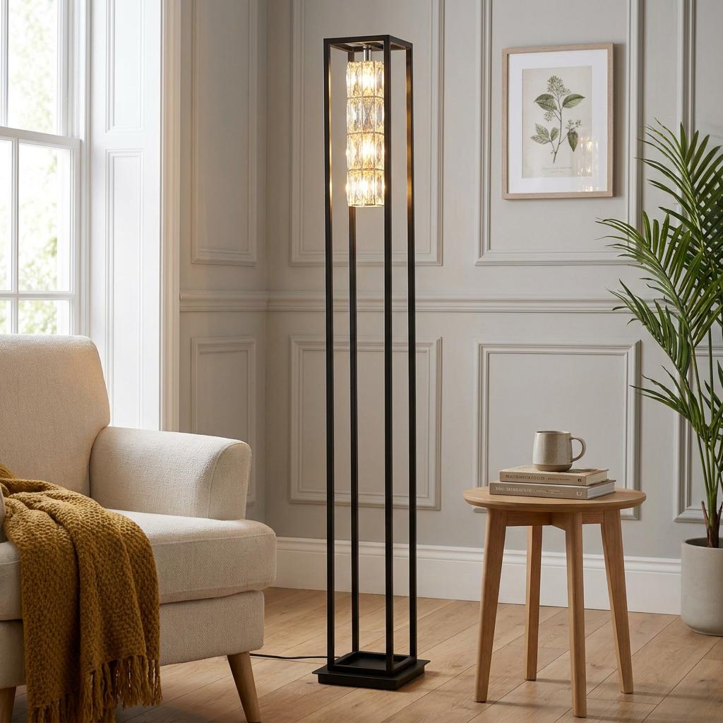 Modern black rectangular floor lamp with a glowing crystal cylinder shade in a cozy living room setting.