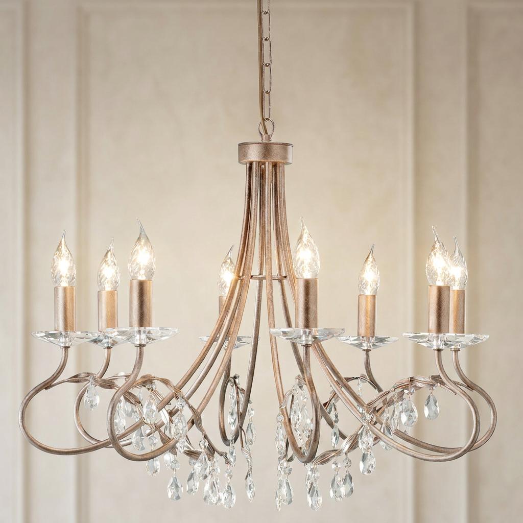 Elegant Christina 8-light chandelier featuring a silver and gold finish with sparkling crystal droplets.