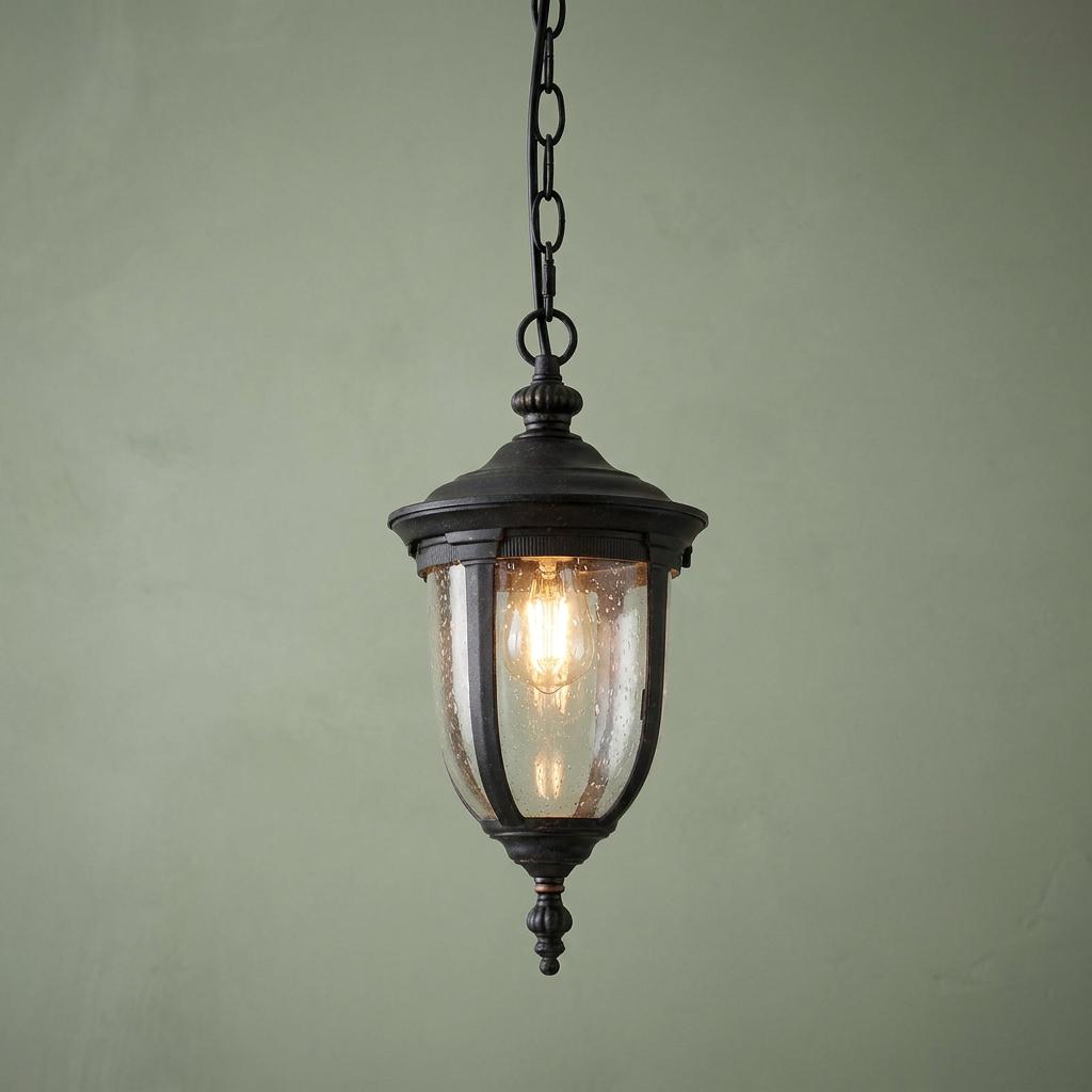 Elstead Cleveland 1 light bronze outdoor small chain lantern with seeded glass shade and hanging chain.