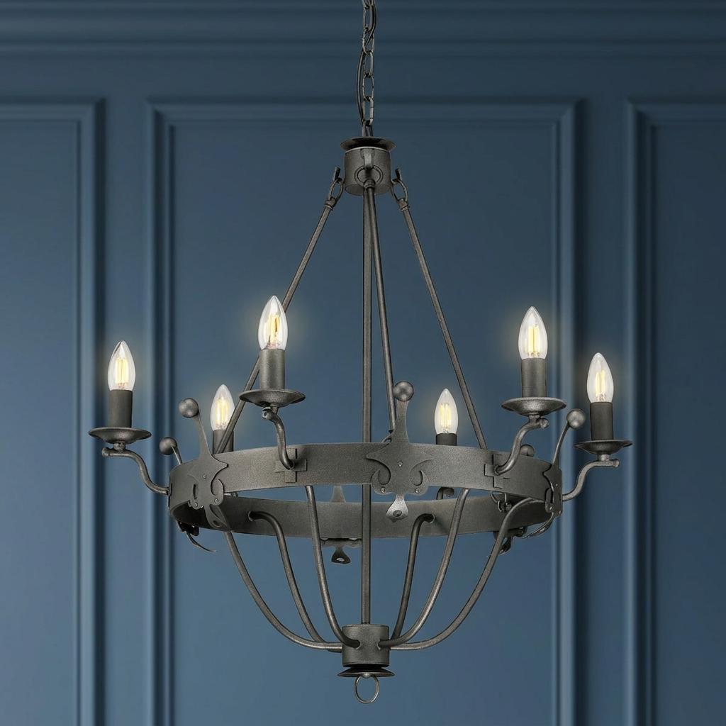 Elstead Lighting Windsor 6-light graphite chandelier with candle bulbs against a blue paneled wall.