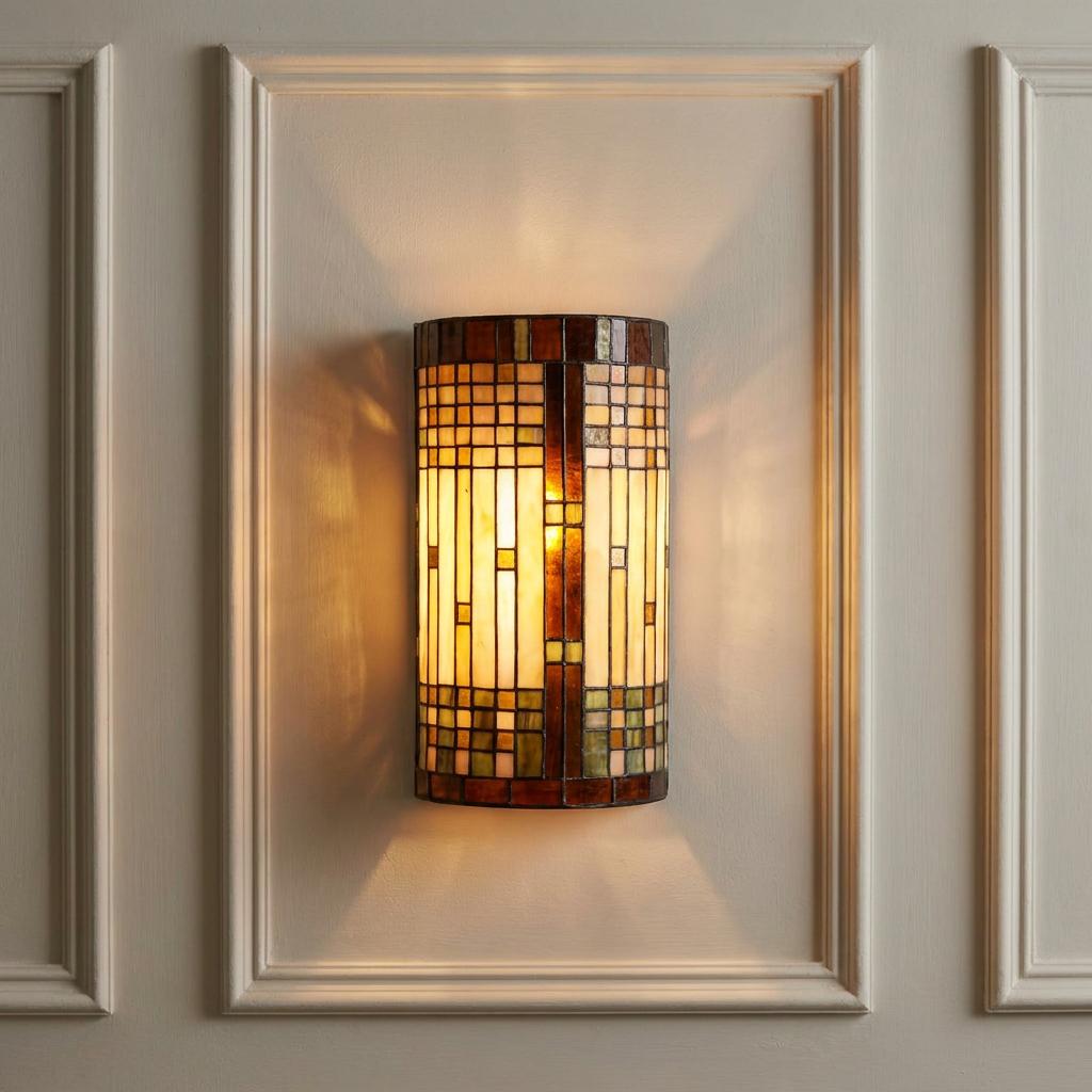 Empire Tiffany wall light featuring a geometric stained glass shade, mounted on a cream paneled wall.