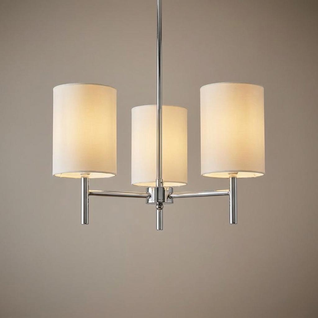 Endon Brio 3-arm chrome semi-flush ceiling light with three cylindrical off-white fabric shades against a neutral wall.