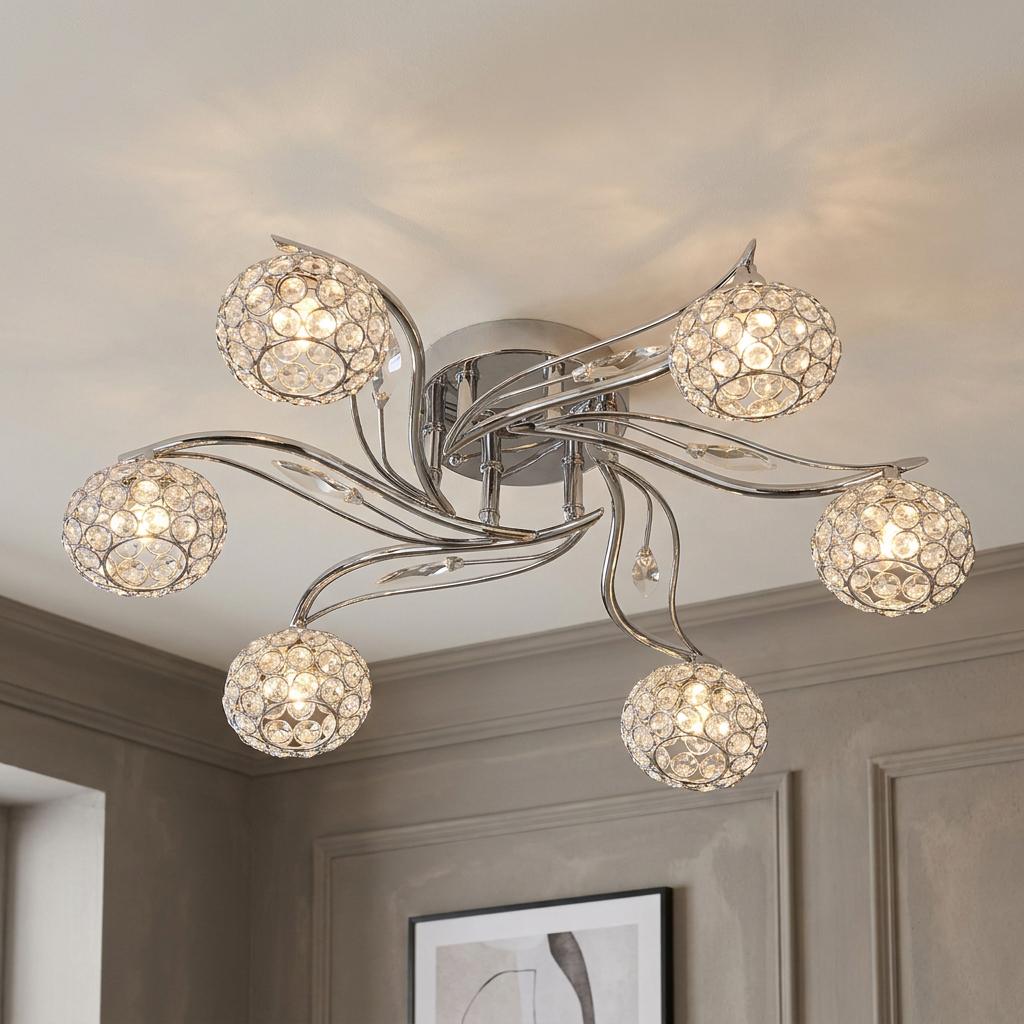 Esmee 6-light chrome flush ceiling light with curved arms and crystal beaded globe shades on a white ceiling.