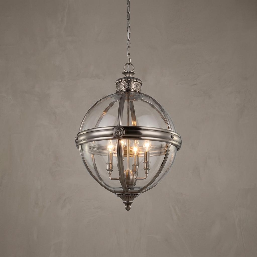 Spherical satin nickel ceiling lantern with clear glass and four candle-style bulbs against a textured gray wall.
