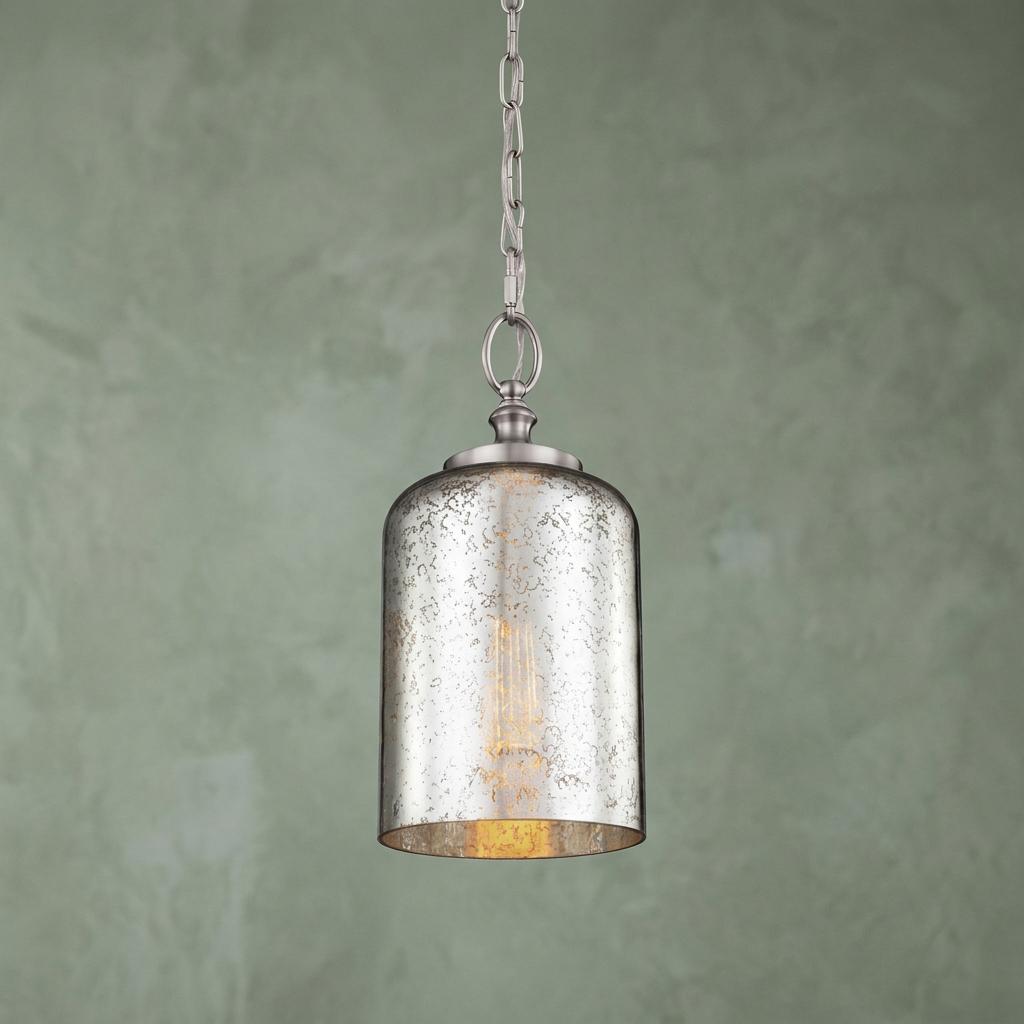 Feiss Hounslow brushed steel pendant light featuring a speckled mercury glass cylindrical shade and Edison bulb.