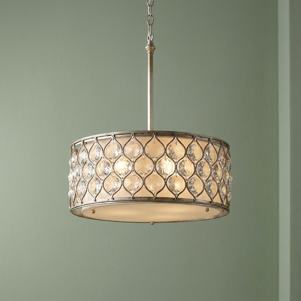 Feiss Lucia 3 Light Burnished Silver Ceiling Pendant with a crystal-studded lattice drum shade against a green wall.