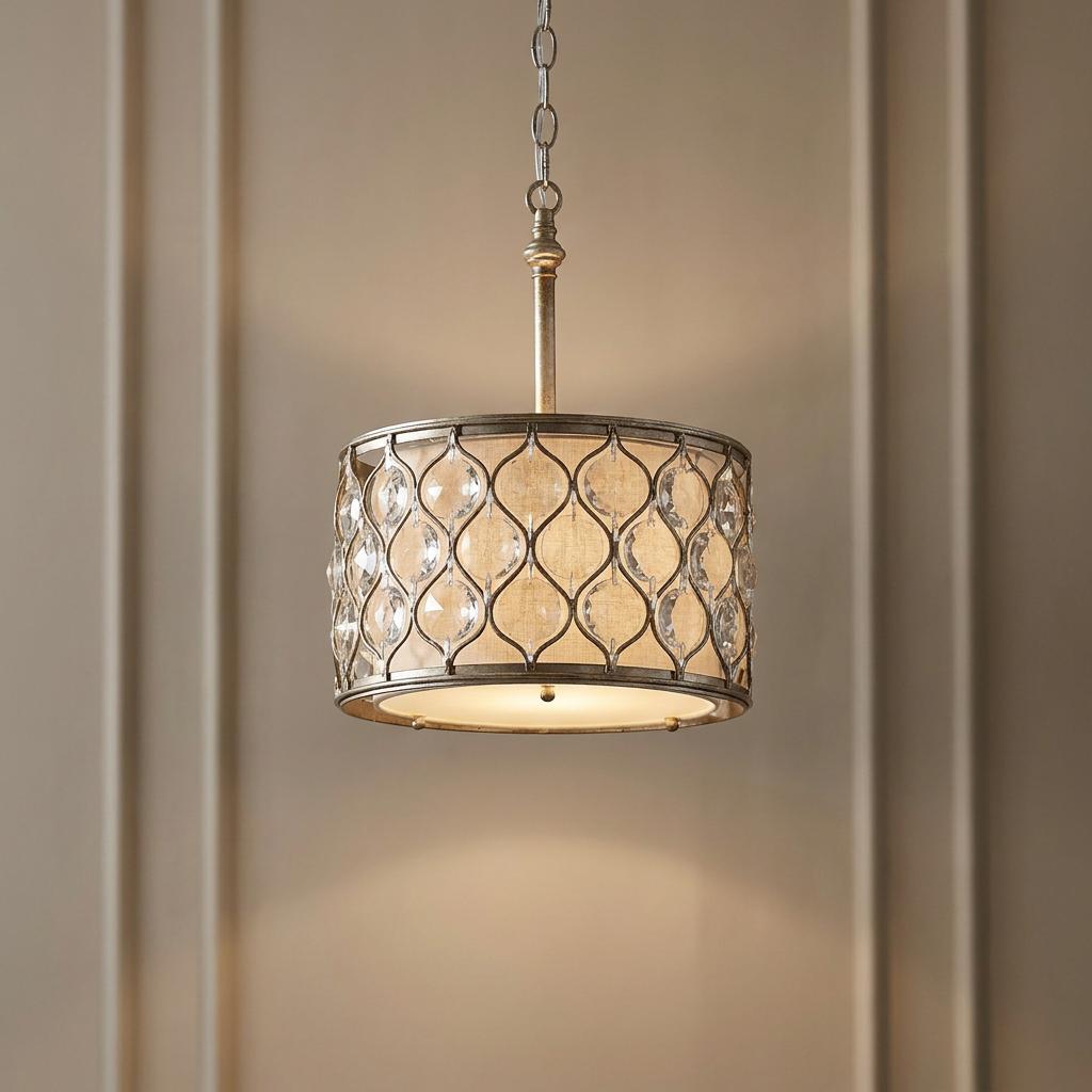 Feiss Lucia pendant light with burnished silver lattice, crystal accents, and beige fabric shade on a paneled wall.