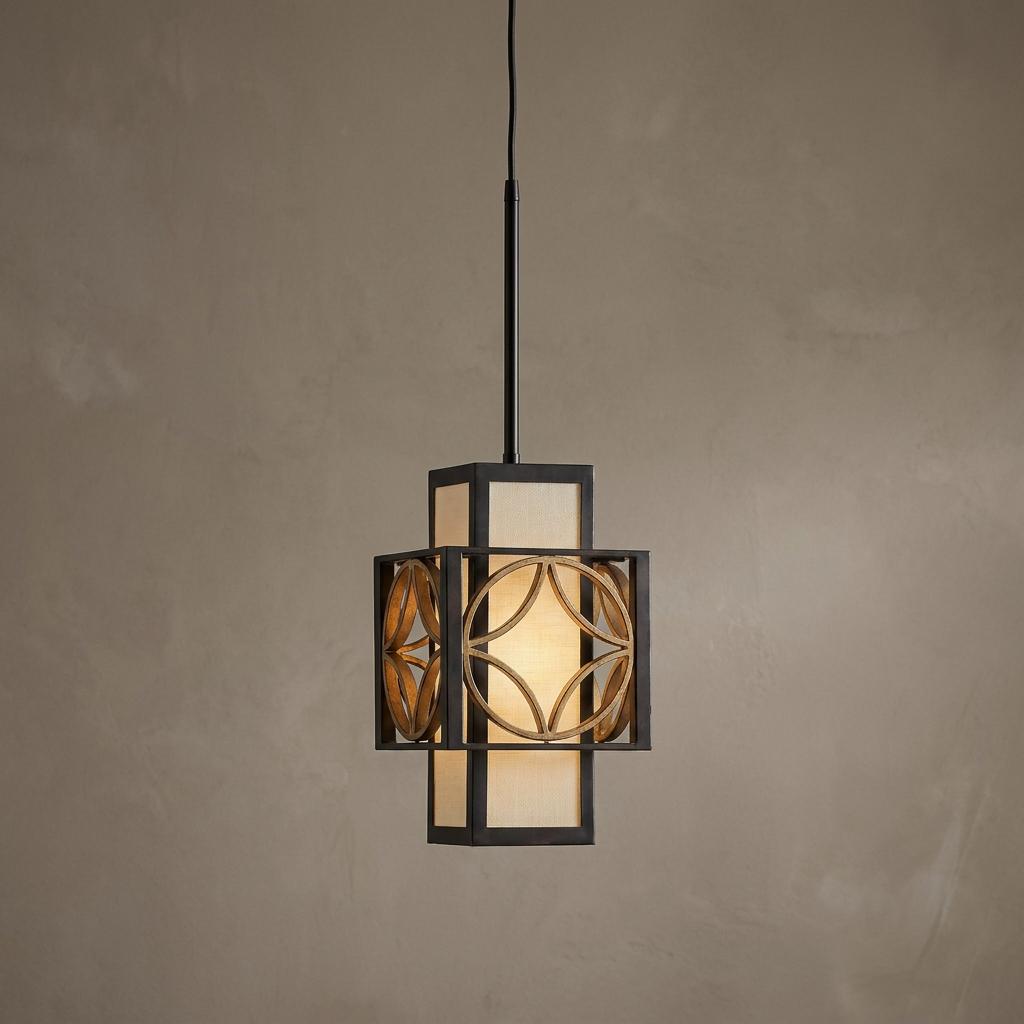 Bronze and gold square pendant light featuring a circular geometric pattern and an internal fabric shade.