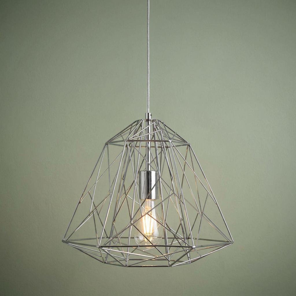 Geometric cage pendant light in chrome with an exposed bulb against a green background.