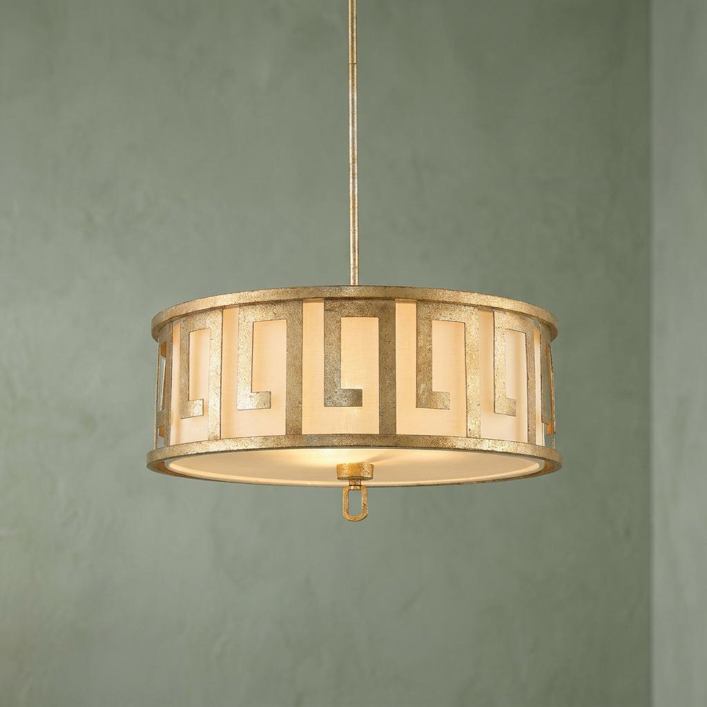 Gilded Nola Lemuria 3-light pendant featuring a gold Greek key pattern over a white linen shade.