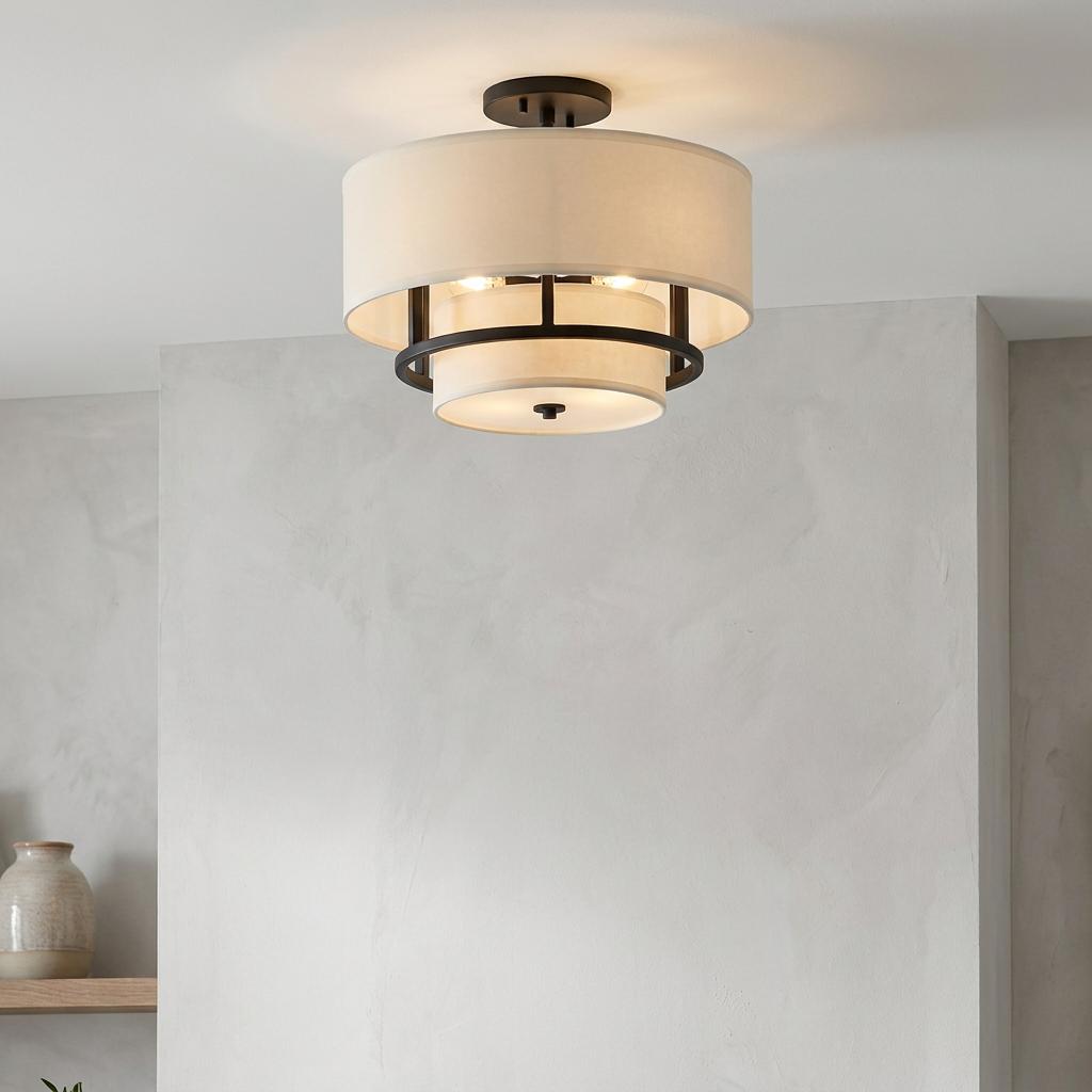 Graham 3-light black semi-flush ceiling light featuring tiered white fabric drum shades on a white ceiling.