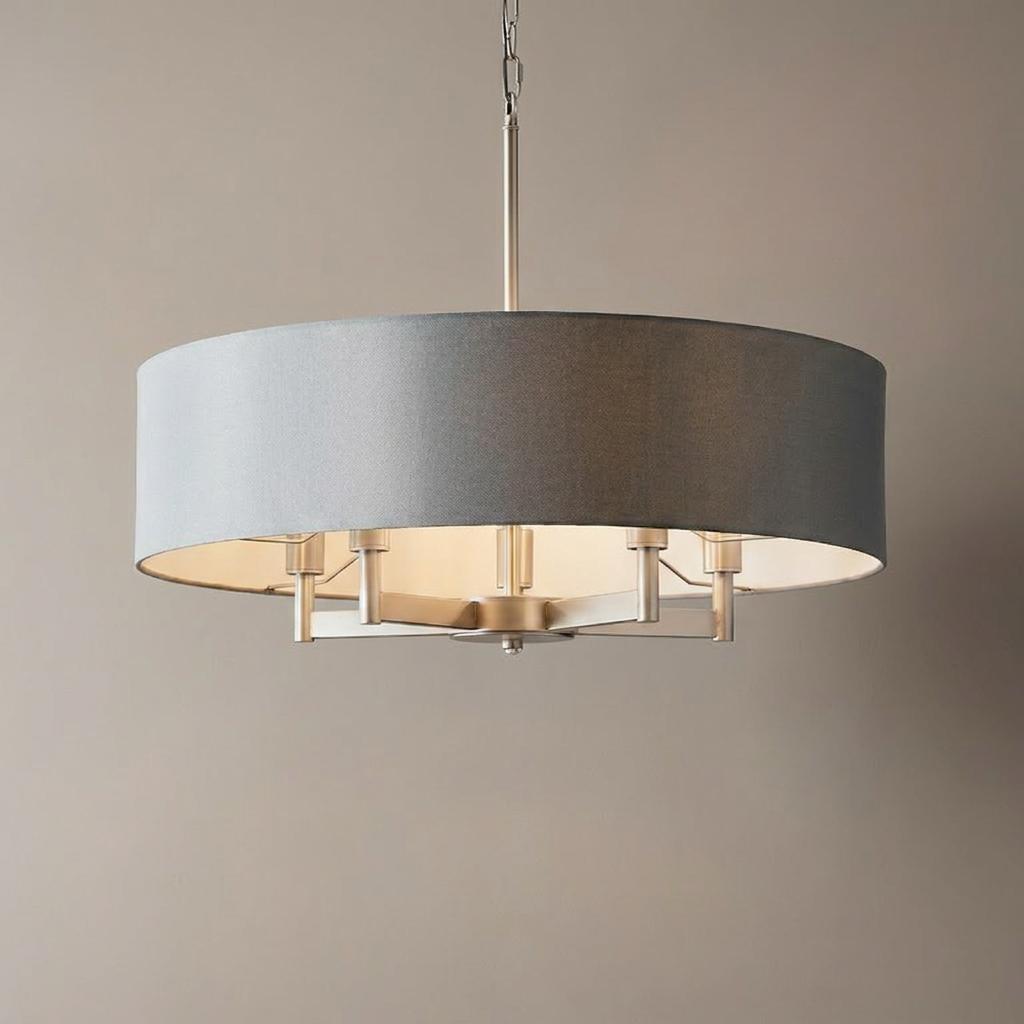 Grande 5-light nickel pendant ceiling light featuring a grey drum fabric shade.