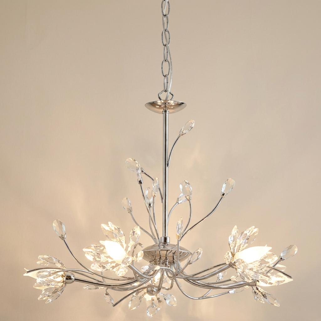 Hibiscus 5 light chrome and crystal ceiling pendant with floral branch-like arms and crystal accents against a plain wall.
