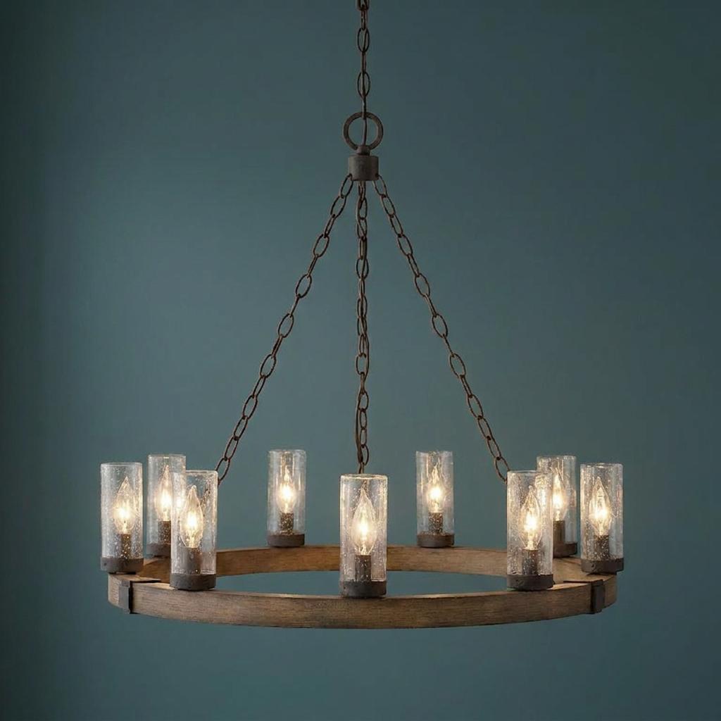 Rustic wood ring chandelier with nine seeded glass cylinders suspended by chains against a teal background.