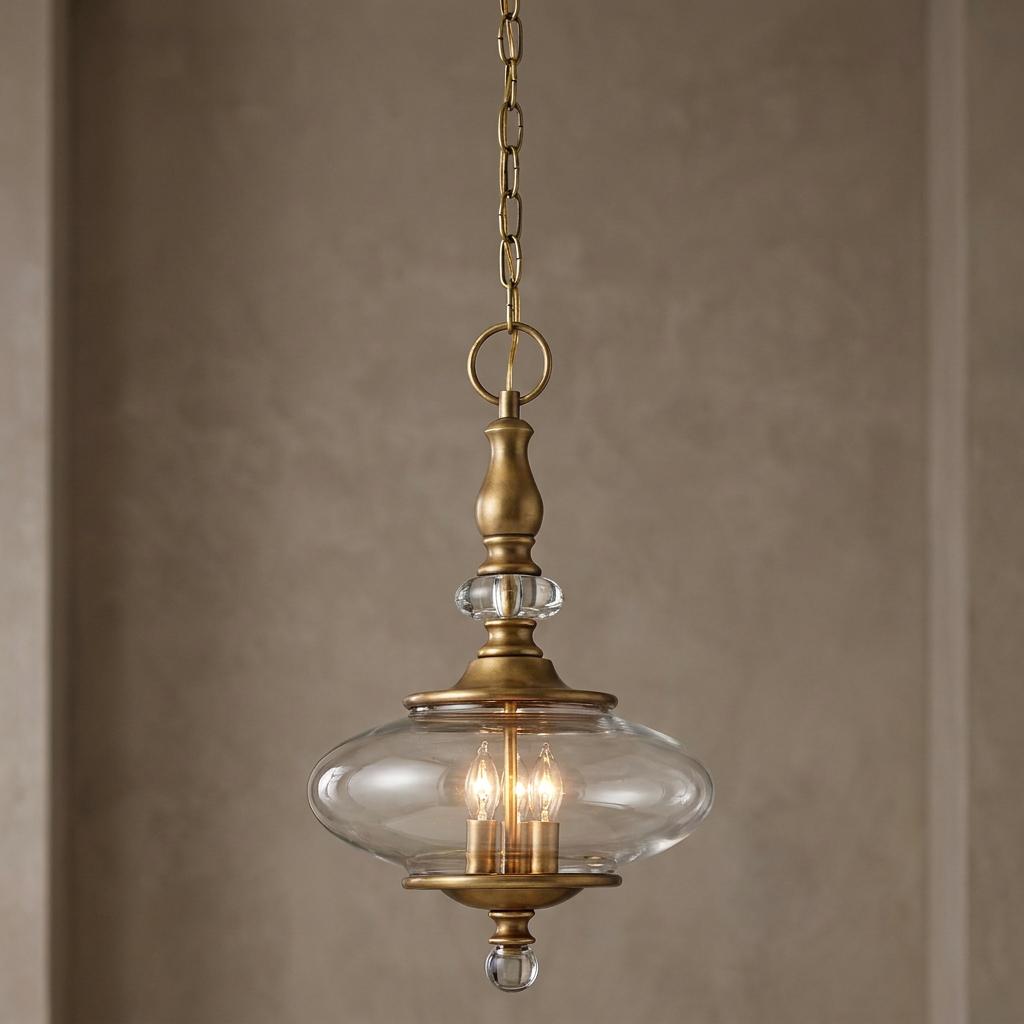 Hinkley Wexley 3-light heritage brass pendant with an ellipsoidal clear glass shade and crystal accents.