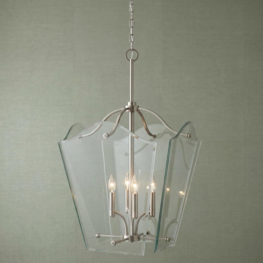 Six-light nickel ceiling lantern with scalloped clear glass panels suspended against a pale green wall.