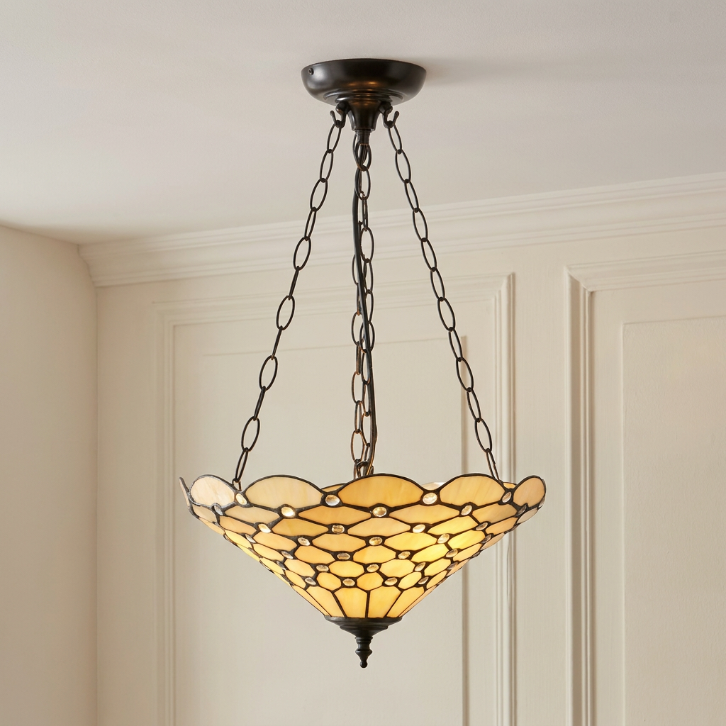 Pearl inverted Tiffany ceiling light with a scalloped cream glass shade and bronze chains in a paneled room.