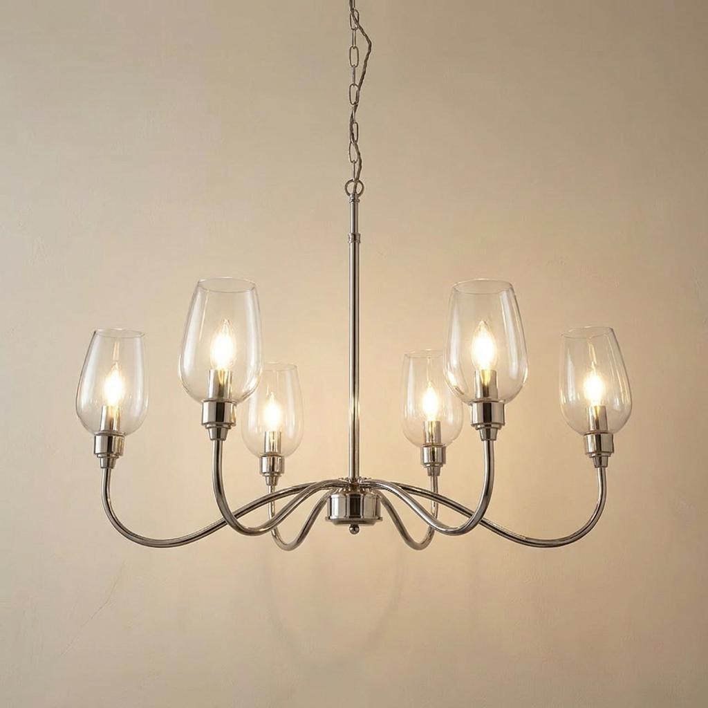 Six-light Art Deco pendant chandelier featuring polished nickel curved arms and clear glass tulip shades.