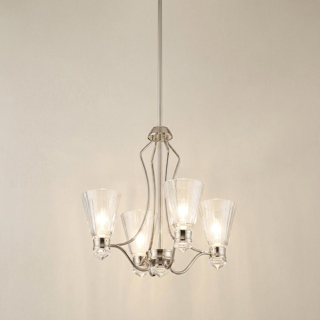 4-light polished nickel chandelier with clear fluted glass shades against a neutral background.