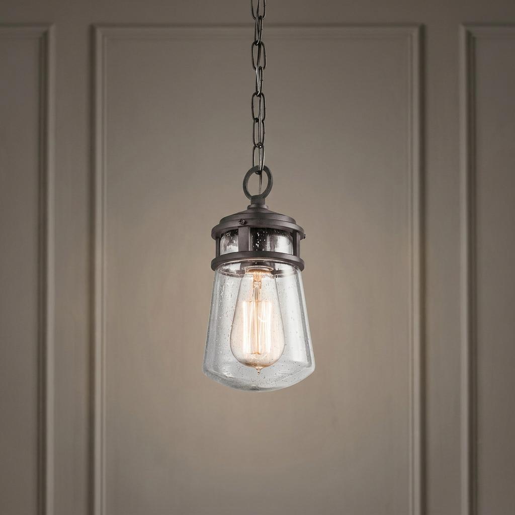 Kichler Lyndon outdoor lantern in architectural bronze with seeded glass and an Edison bulb.