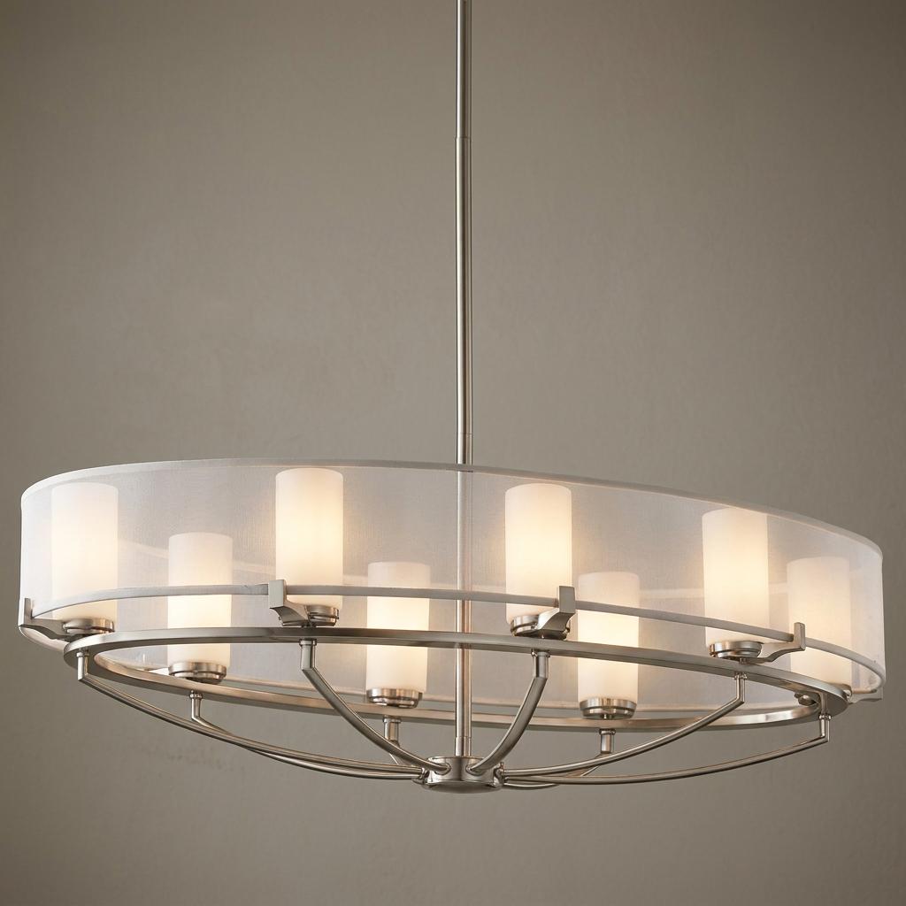 Eight-light oval pewter chandelier featuring a white organza outer shade and opal glass inner cylinders.