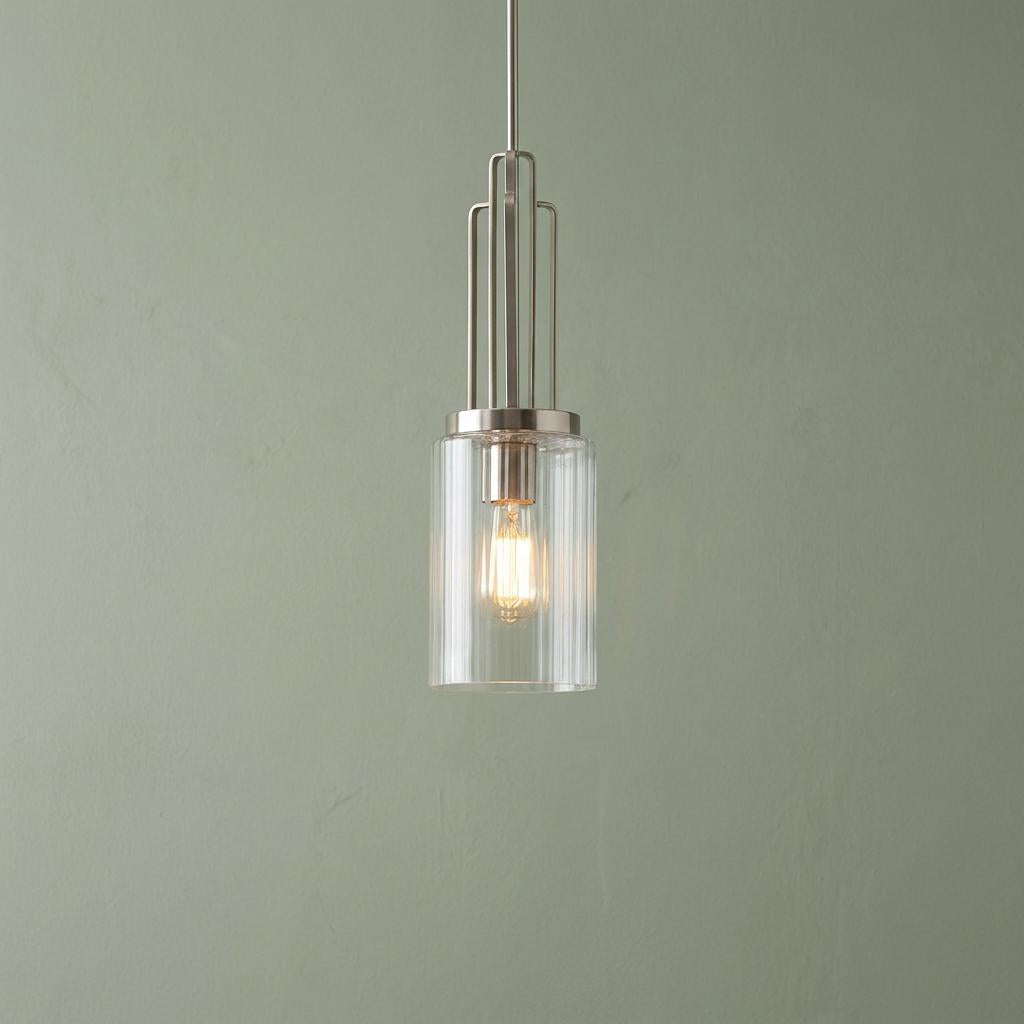 Kimrose mini pendant light with tiered nickel rods and clear ribbed glass shade against a sage green wall.