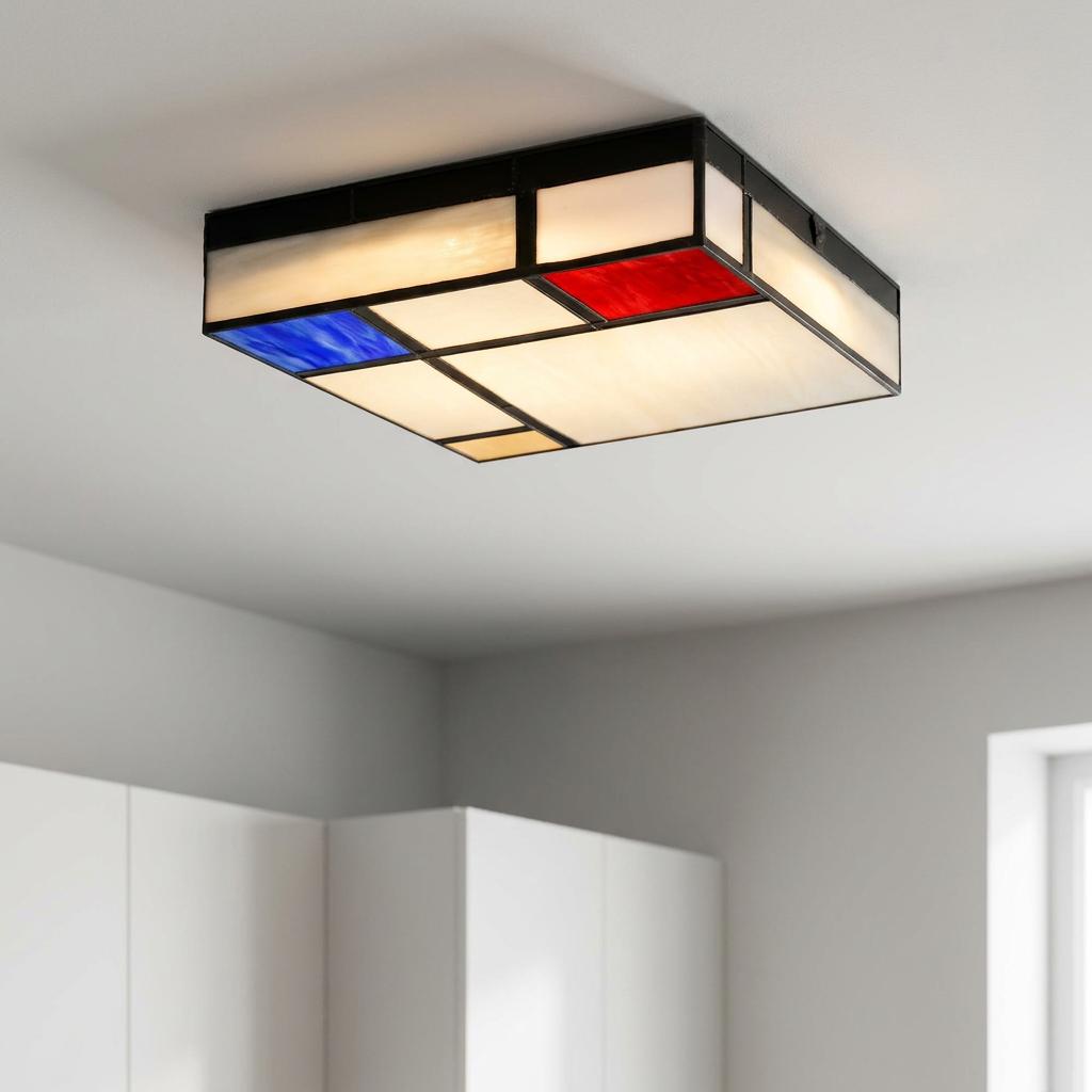 Square Mondriaan-style flush ceiling light with red and blue stained glass panels mounted on a white ceiling.