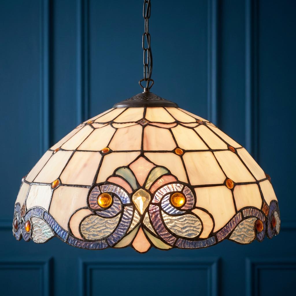 Newcastle Tiffany pendant light with cream and purple stained glass shade on a dark blue paneled wall.