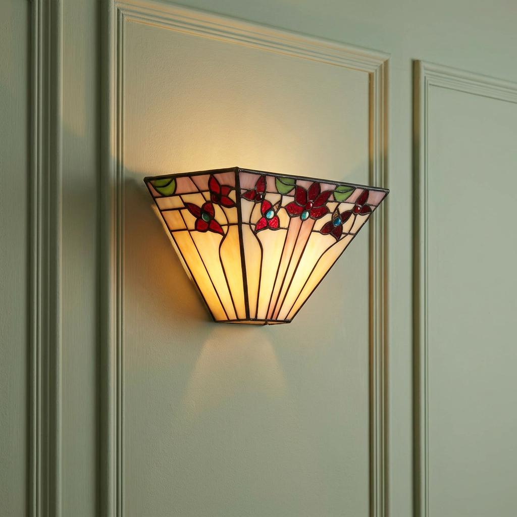 Illuminated Oaks Lighting Camillo Tiffany wall light with red floral patterns on a panelled green wall.