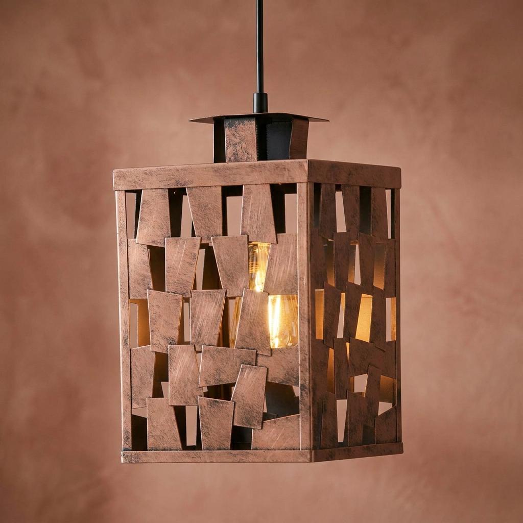 Rectangular copper painted pendant light featuring a textured geometric pattern and warm internal glow.