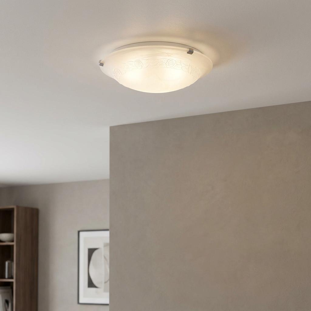 Oaks Lighting Rosa small flush ceiling light with rose-etched alabaster glass illuminated in a modern interior.