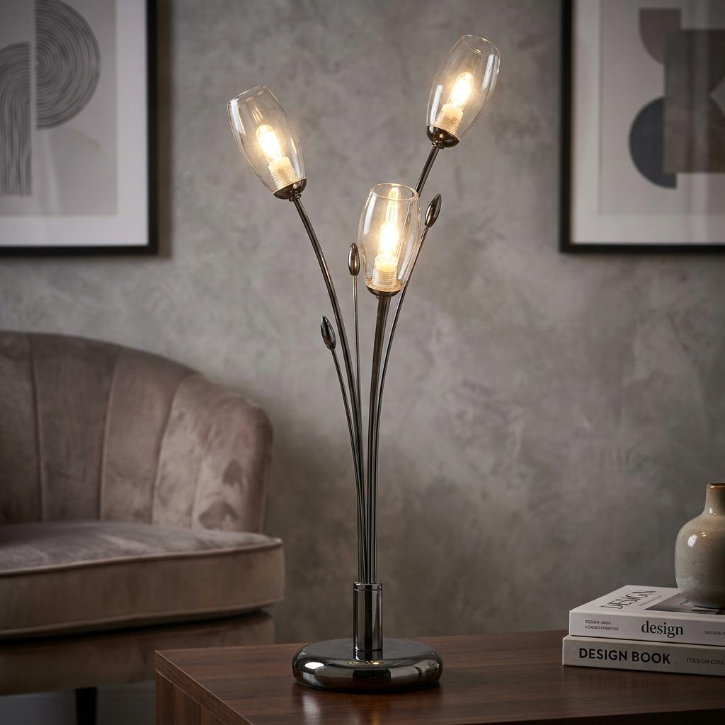 Pandora 3-light mirror black table lamp with illuminated glass shades on a wooden table in a modern living room.
