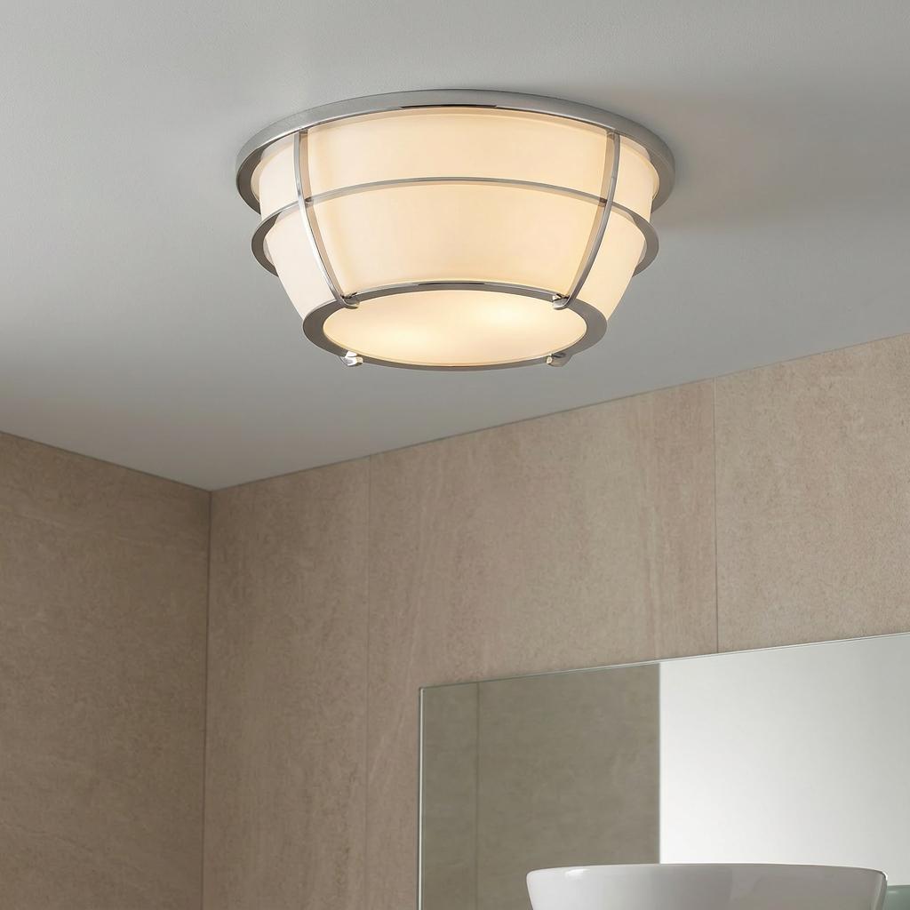 Quoizel Chance chrome flush mount bathroom ceiling light with frosted glass and a metal cage frame.