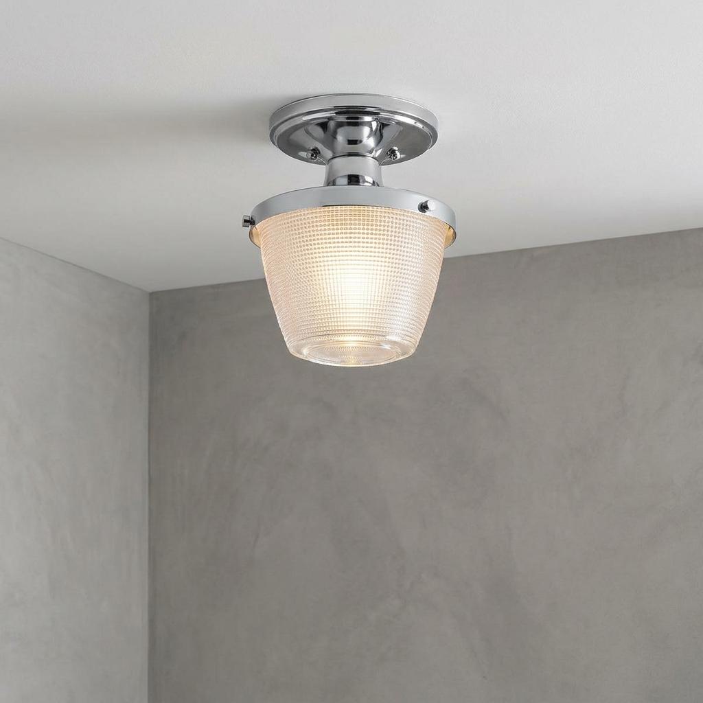Polished chrome semi-flush ceiling light with a textured glass shade mounted on a white ceiling.