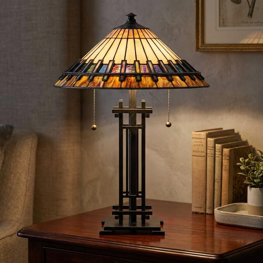 Mission-style Tiffany table lamp with a geometric glass shade on a dark wood table in a warm interior.