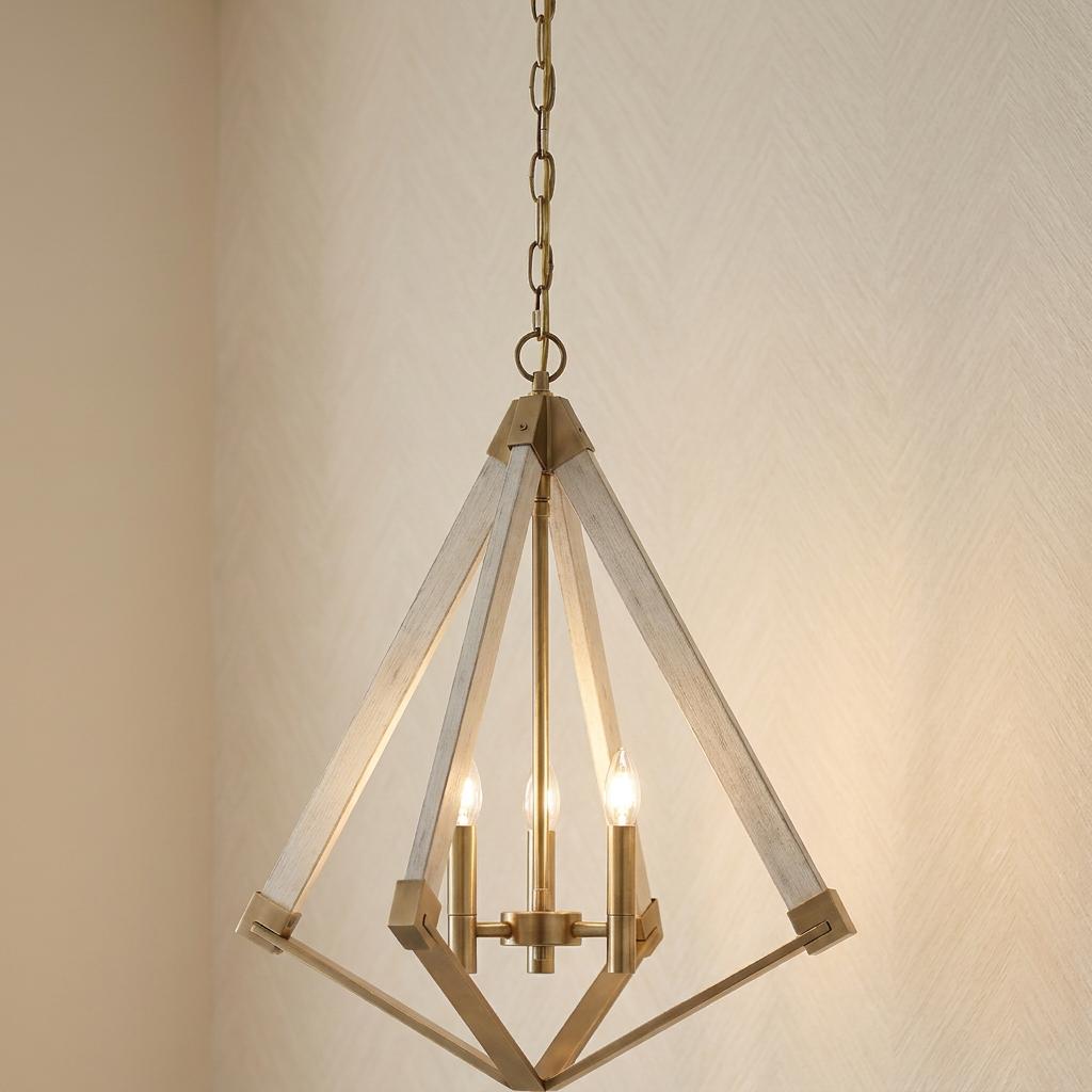 Rustic 3-light chandelier featuring a weathered brass frame and whitewashed wood diamond cage hanging against a beige wall.