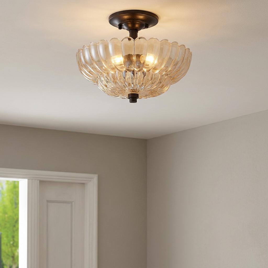Semi-flush ceiling mount with a scalloped amber glass shade and oil rubbed bronze finish.