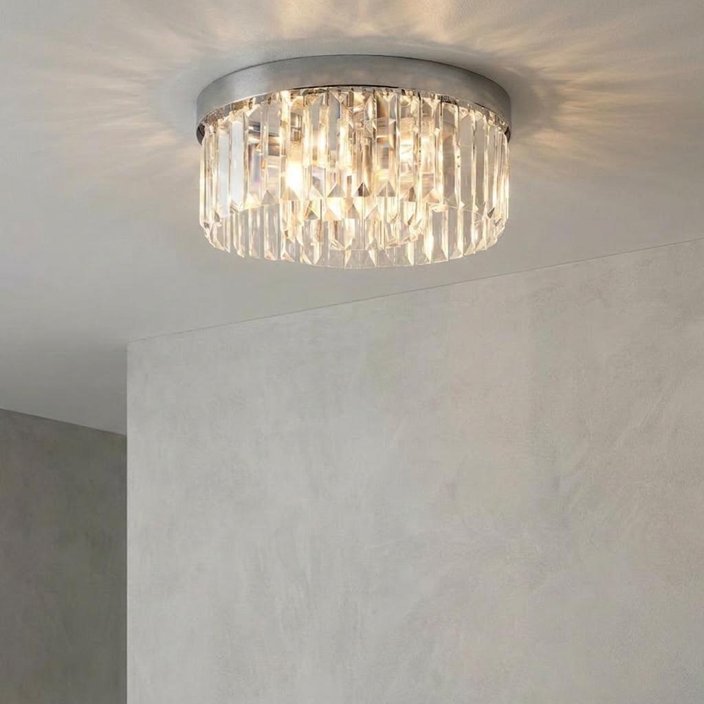 Saxby Crystal 5-light flush ceiling light with glass prisms and chrome trim, lit in a modern interior.