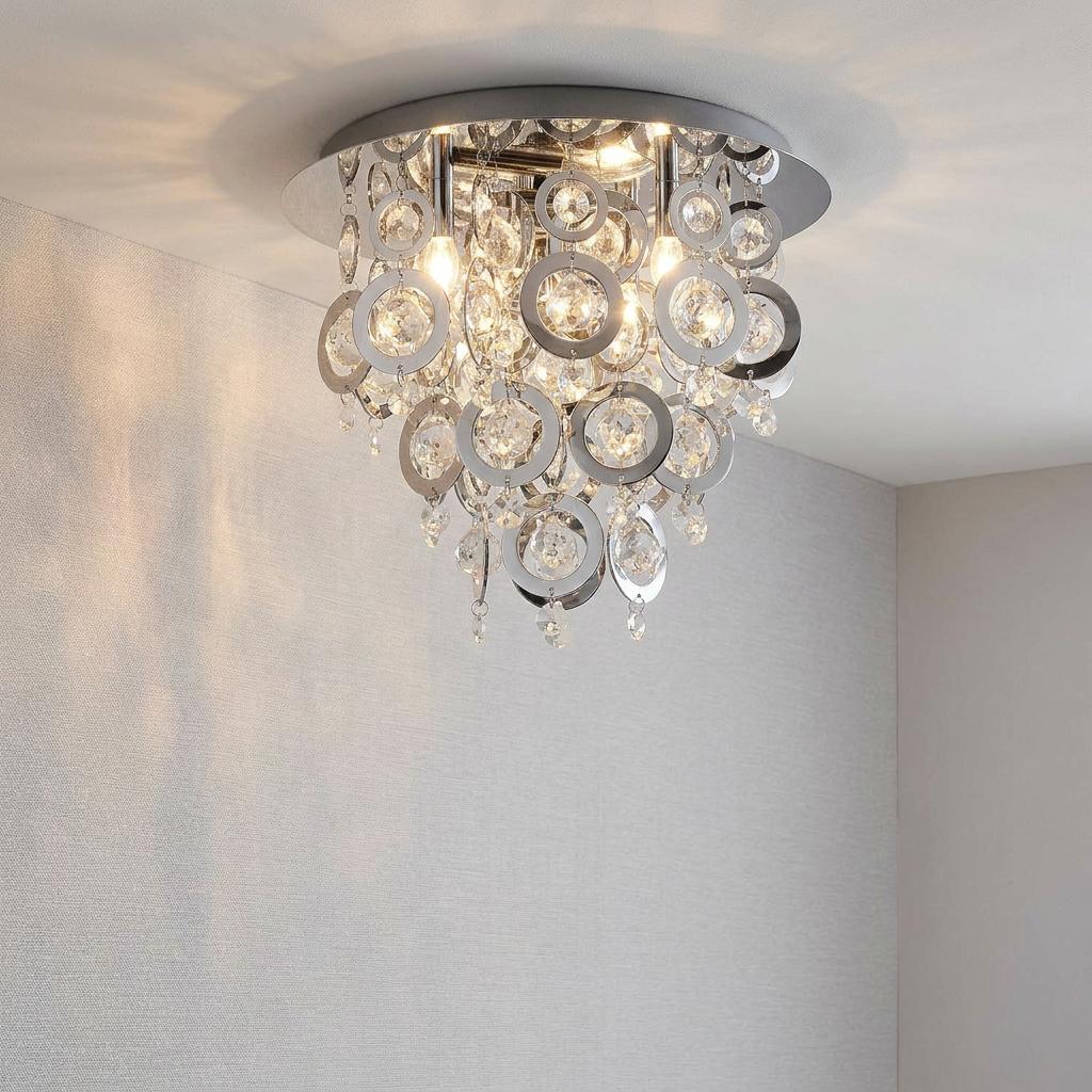 Modern chrome flush ceiling light featuring cascading rings and sparkling crystal glass droplets.